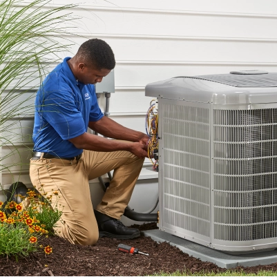 carrier hvac tech repairing unit