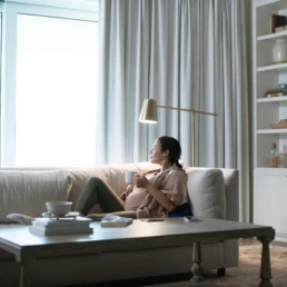 woman relaxing in living room